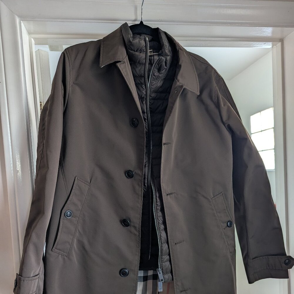 This is a brown Burberry trench coat with a removable quilted line